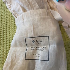 Kyte Baby linen ring sling in Aspen with rose gold hardware